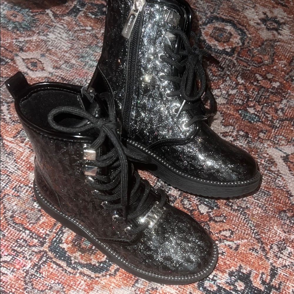 Black Combat Boots with Metallic Overlay and Textured Design